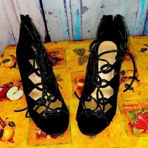 Very sharp high heel boots by Lauren Conrad